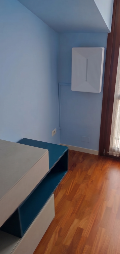 Installazione Helty FLow PLUS in una camera da letto in un sottotetto